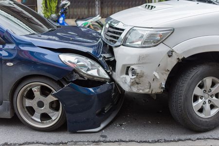 stock-photo-car-crash-from-car-accident-on-the-road-in-a-city-between-saloon-versus-pickup-wait-insurance-454667446_1.jpg